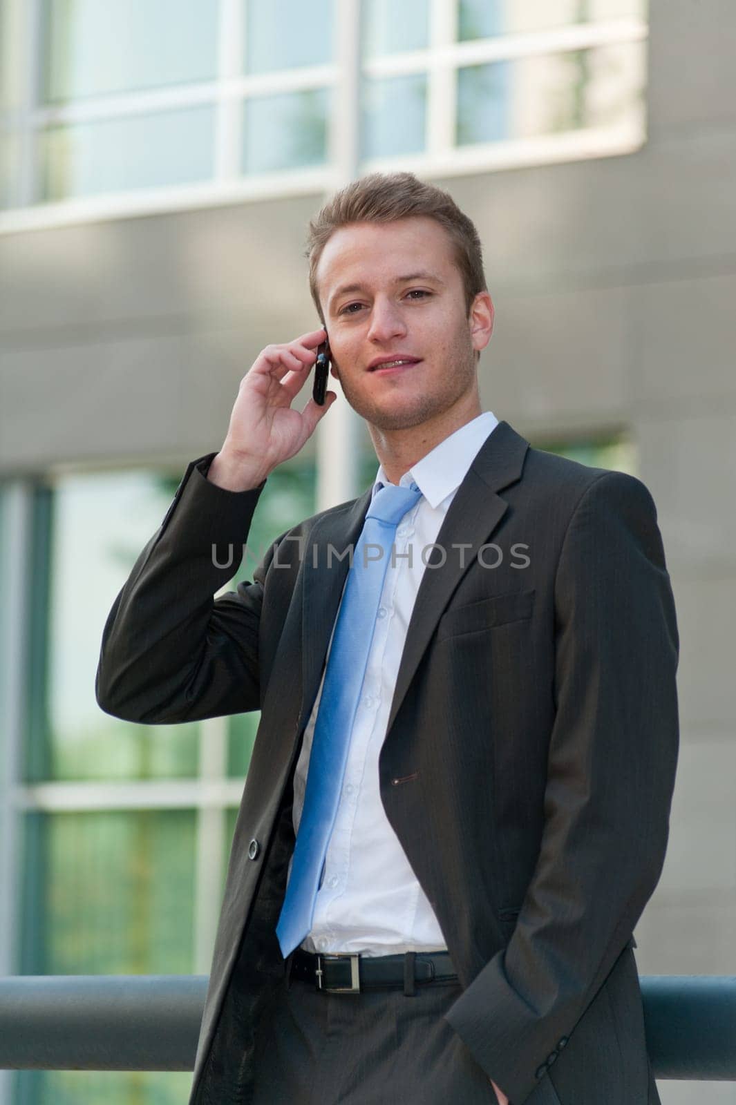 Young business man with a telephon
