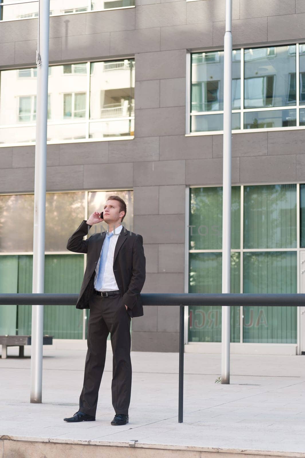 Young business man with a telephon