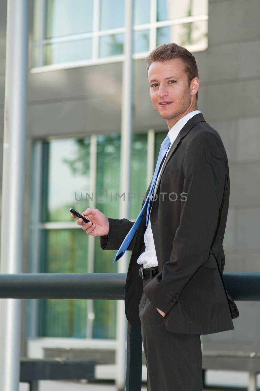 Young business man with a telephon