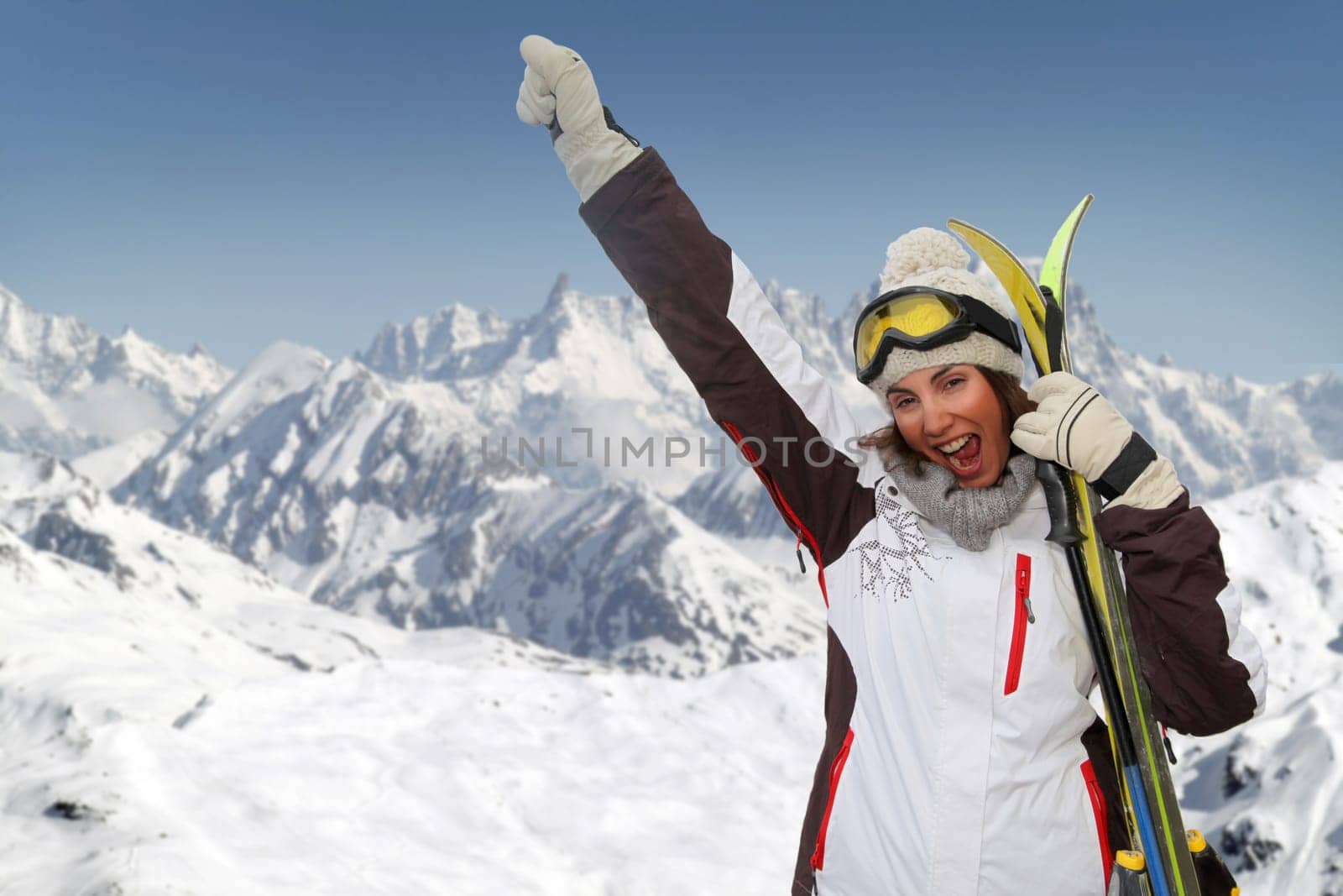 Beautiful woman having fun at the mountain