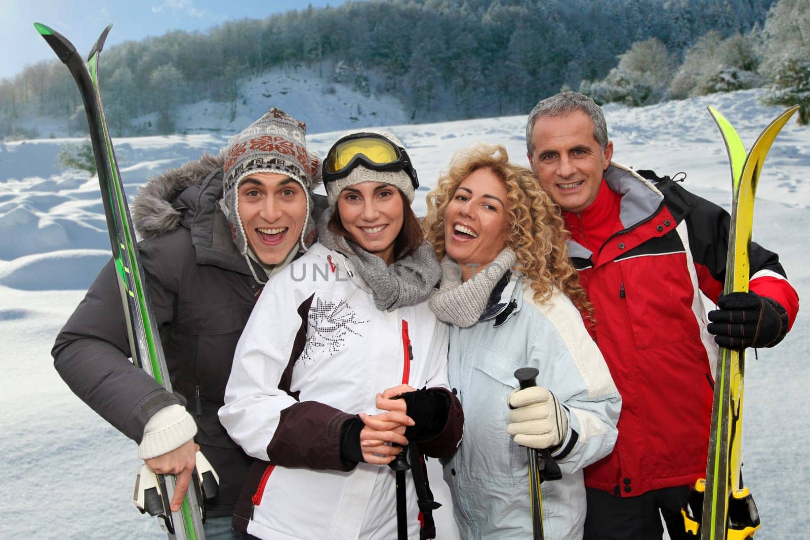 Group of happy friends in winter vacation