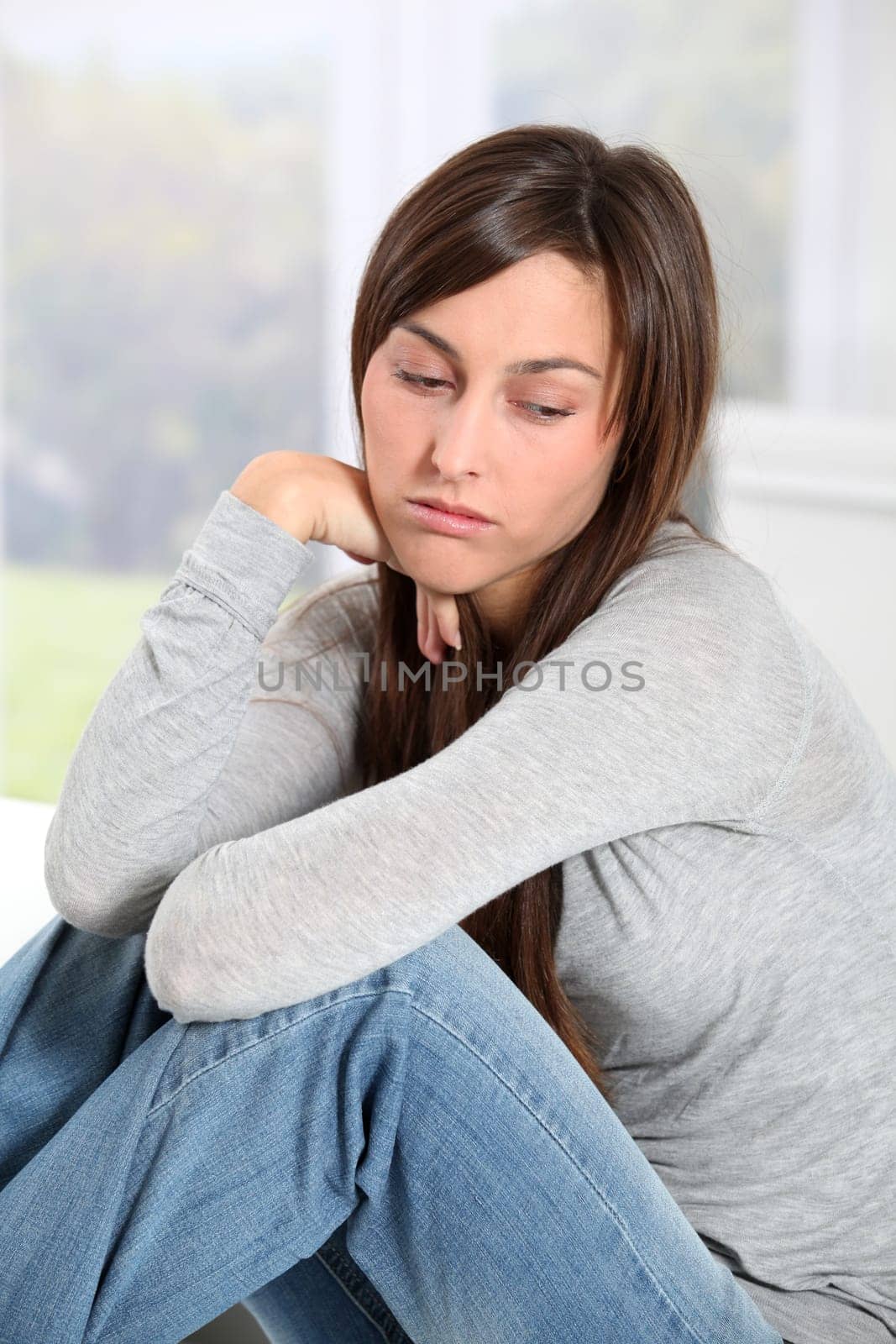 Closeup of depressed young woman