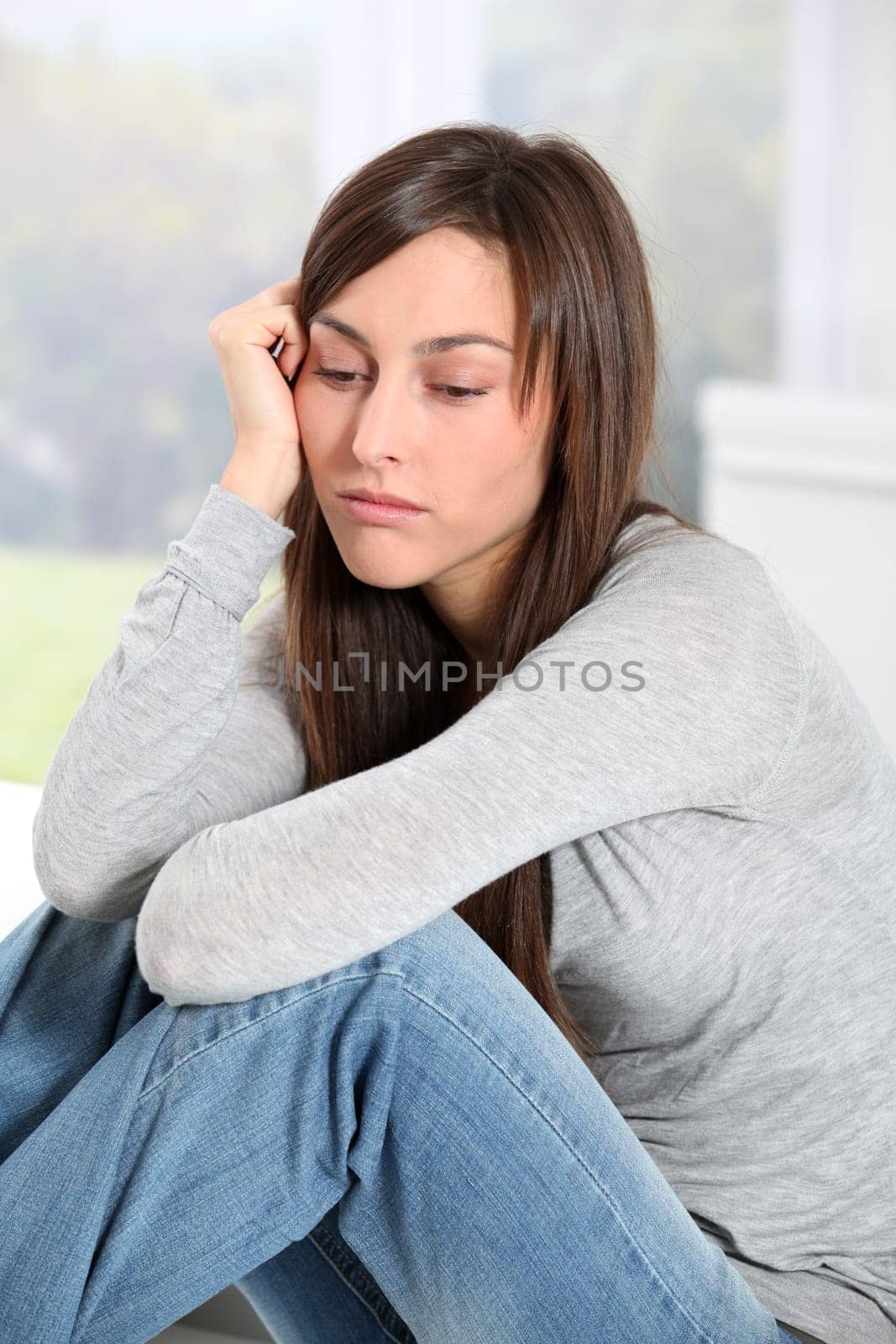 Closeup of depressed young woman