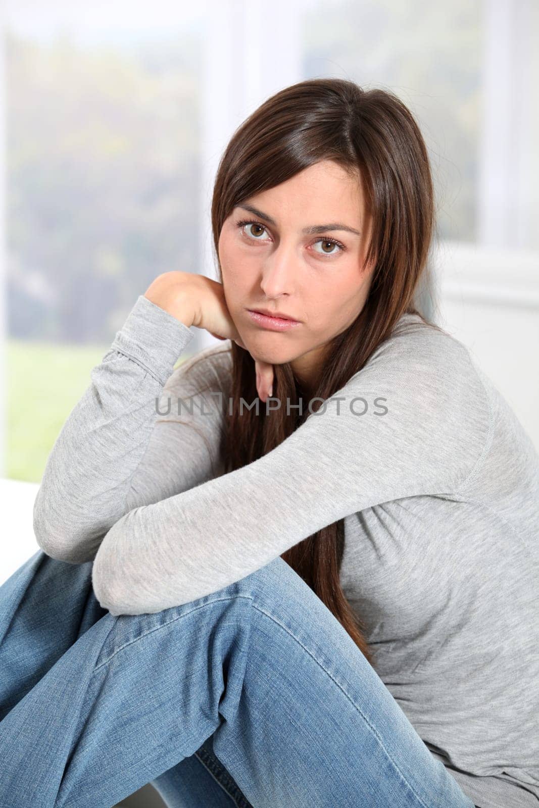 Closeup of depressed young woman