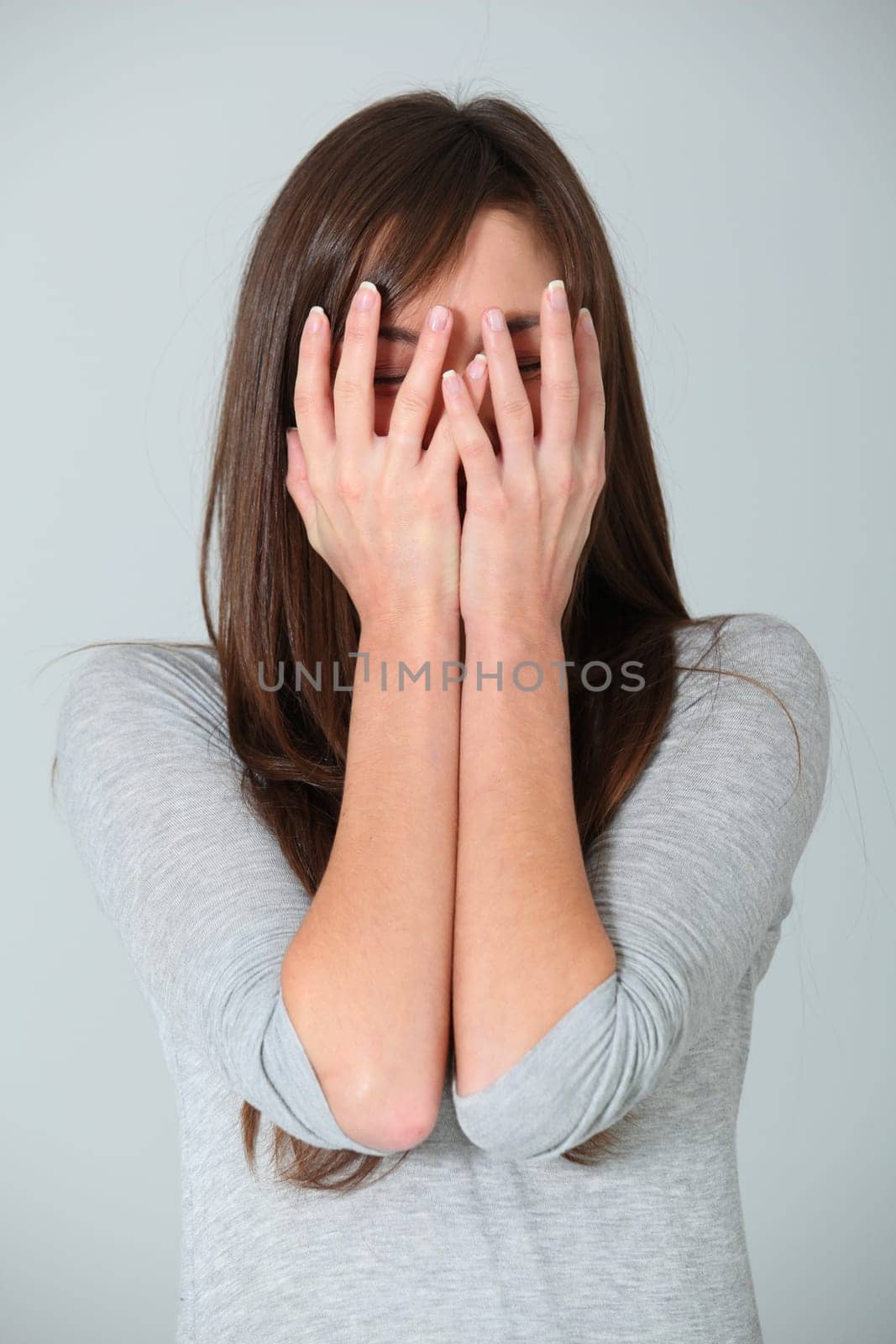 Portrait of scared young woman