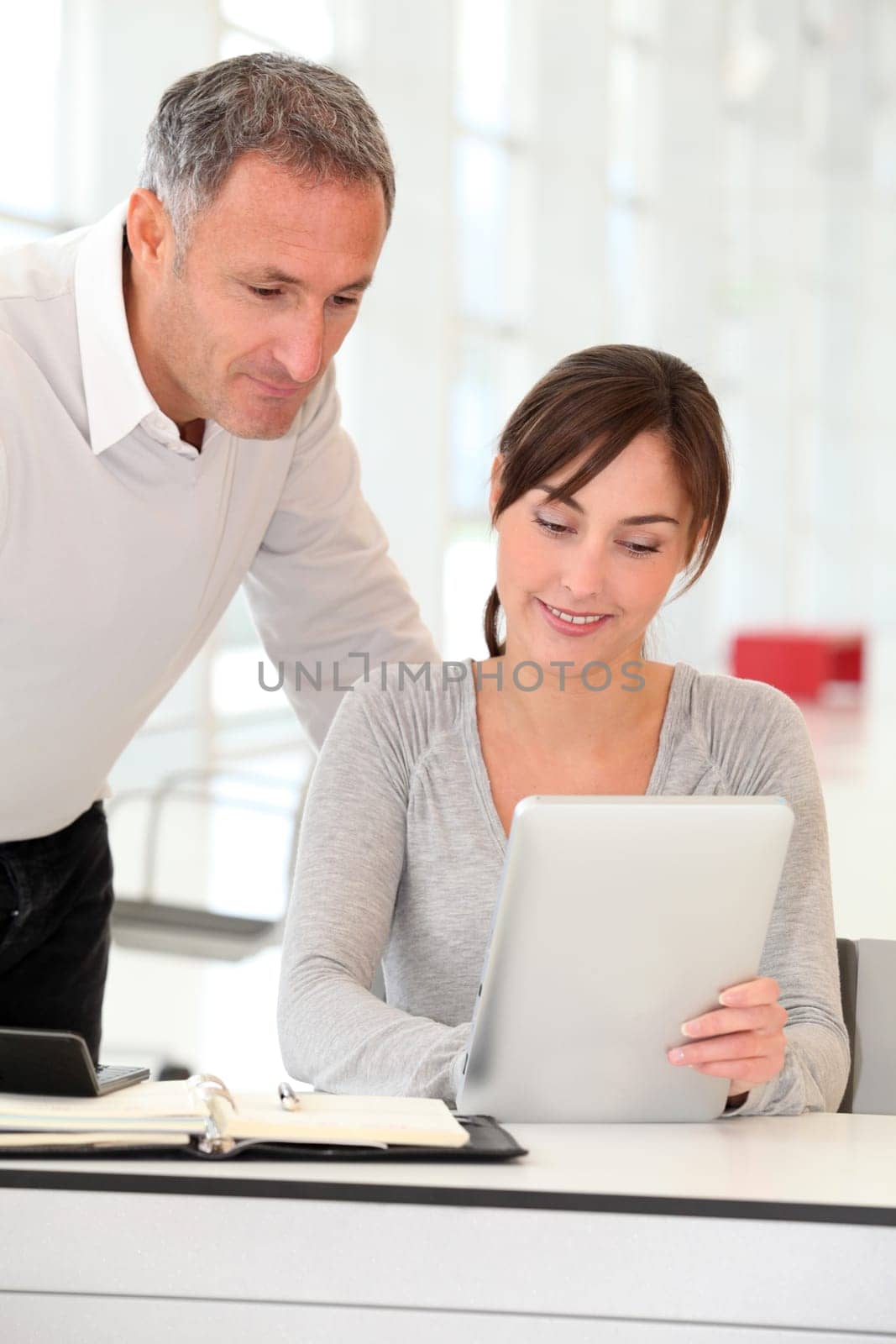 Business people working in ofice with electronic pad