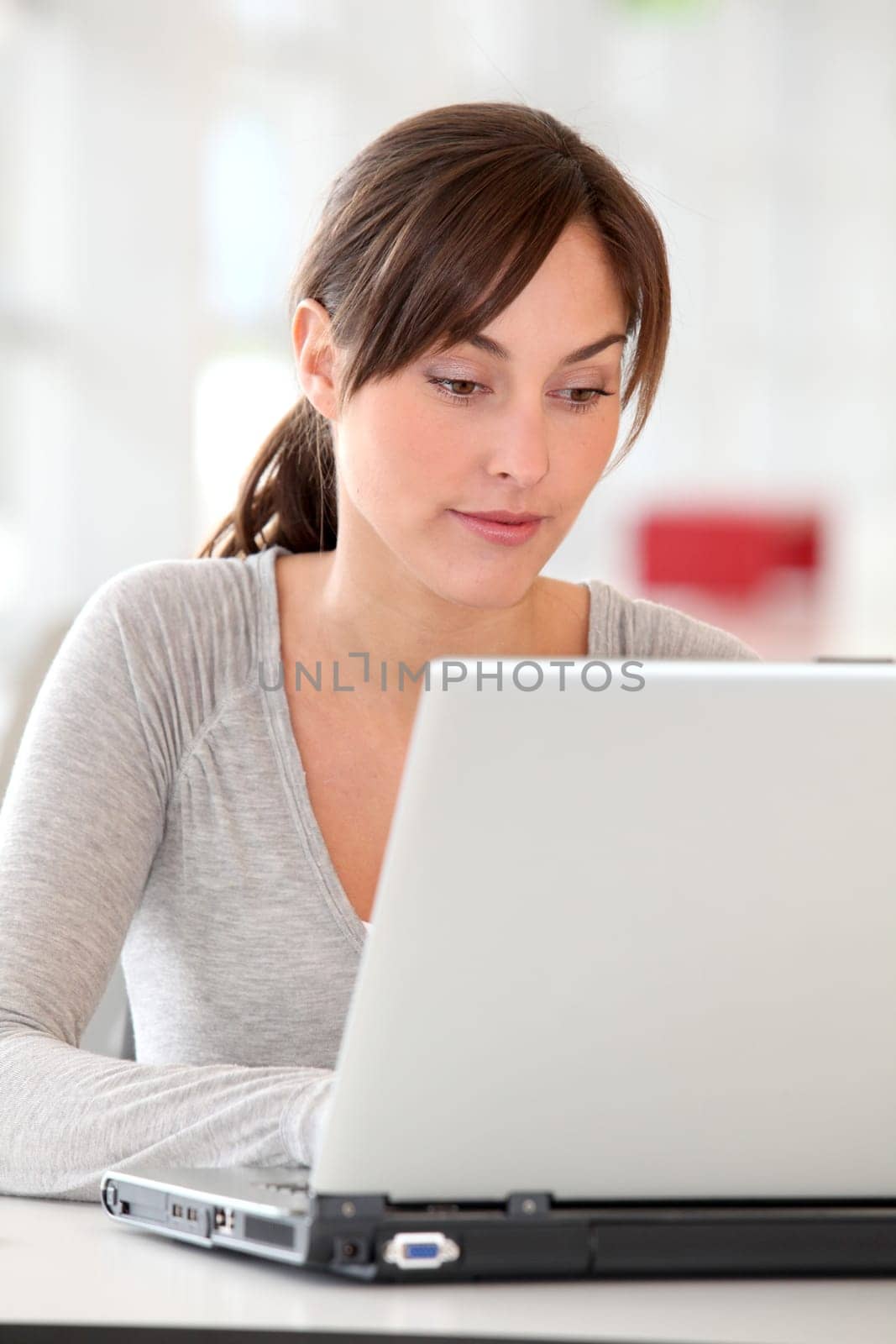 Closeup of beautiful woman working in the office