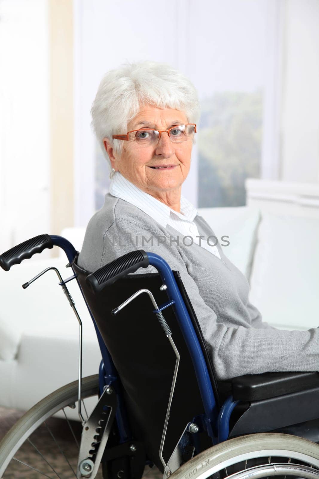 Elderly woman in wheelchair