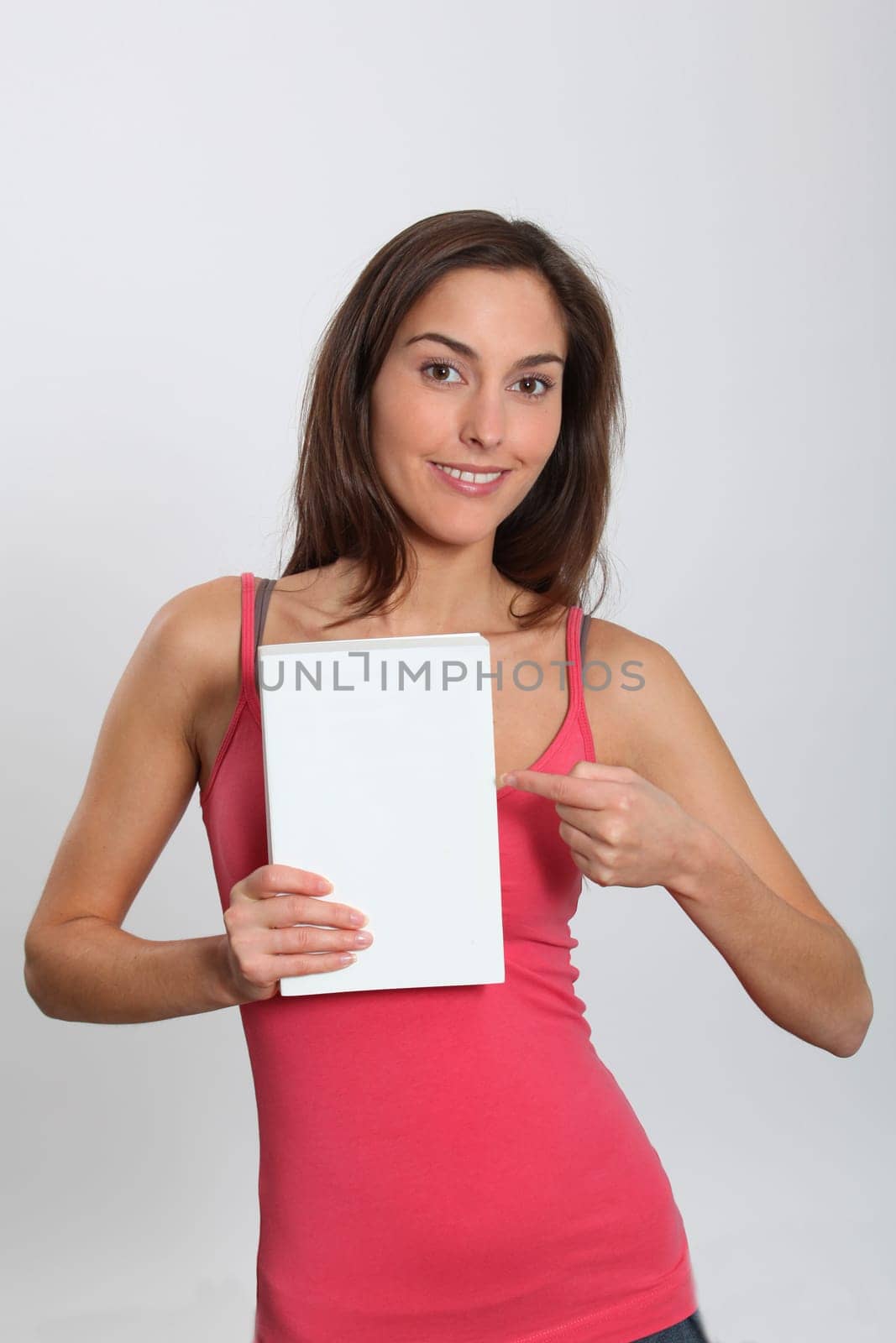 Smiling woman showing message sign