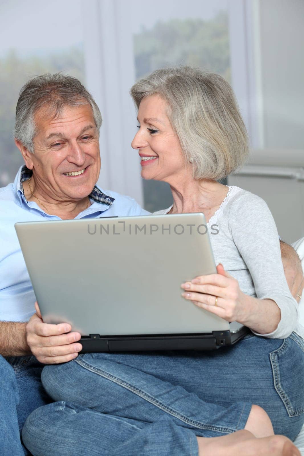 Senior couple surfing on internet