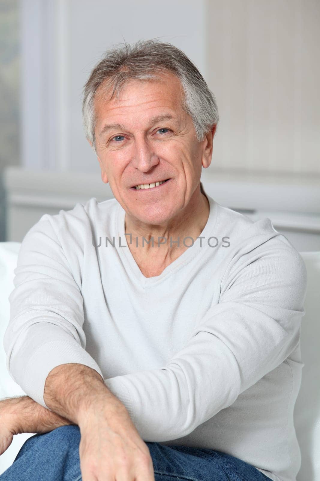 Portrait of smiling senior man