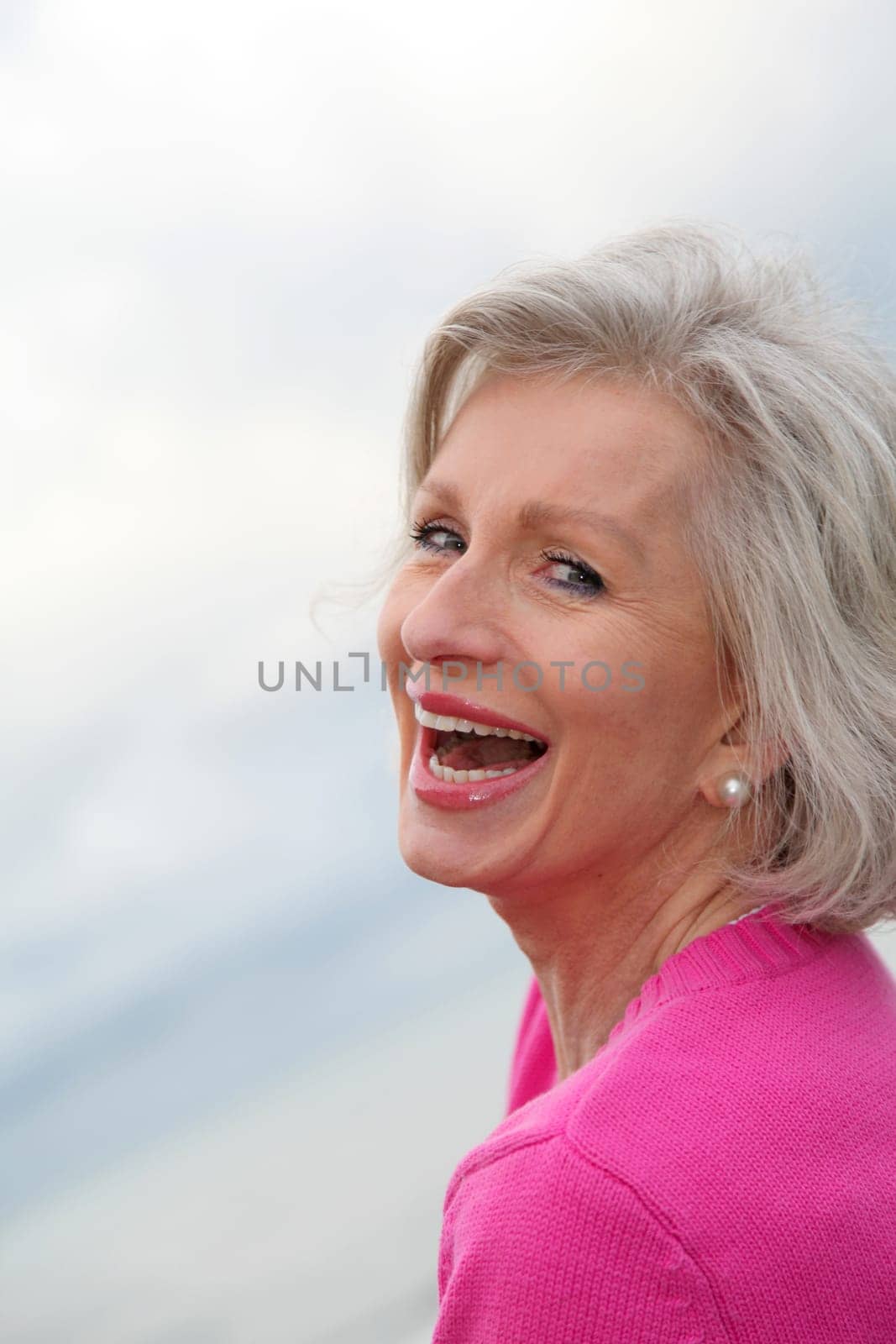 Portrait of laughing senior woman