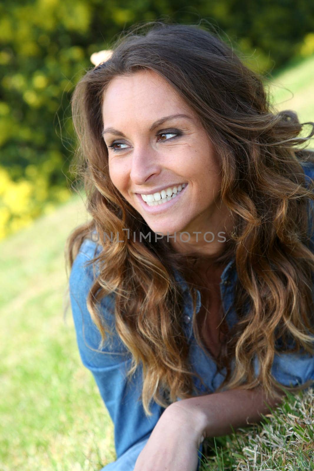 Portrait of beautiful woman relaxing in home garden