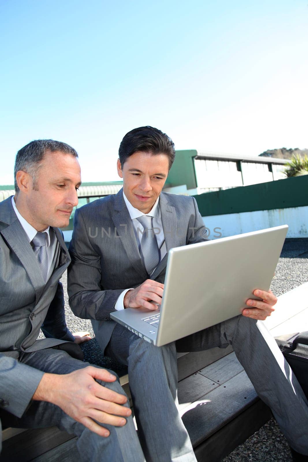 Sales people meeting outside the office
