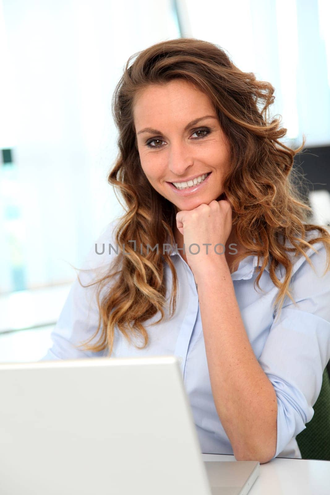 Portrait of smiling businesswoman in the office