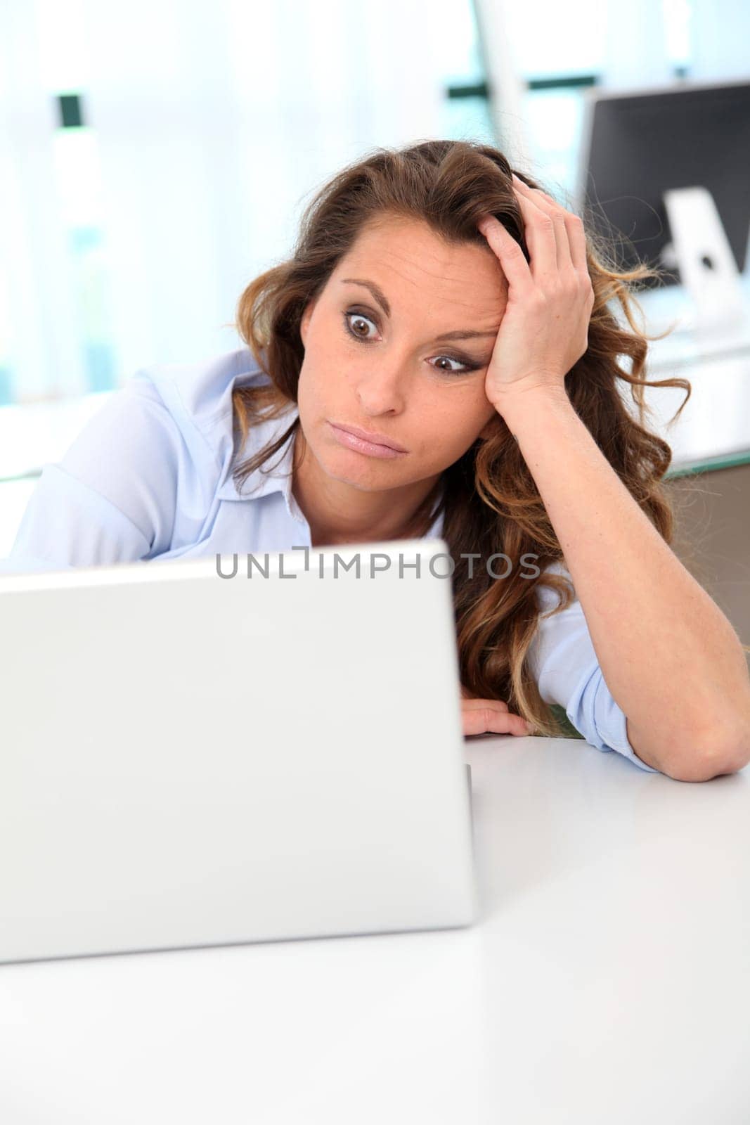 Portrait of exhausted office worker
