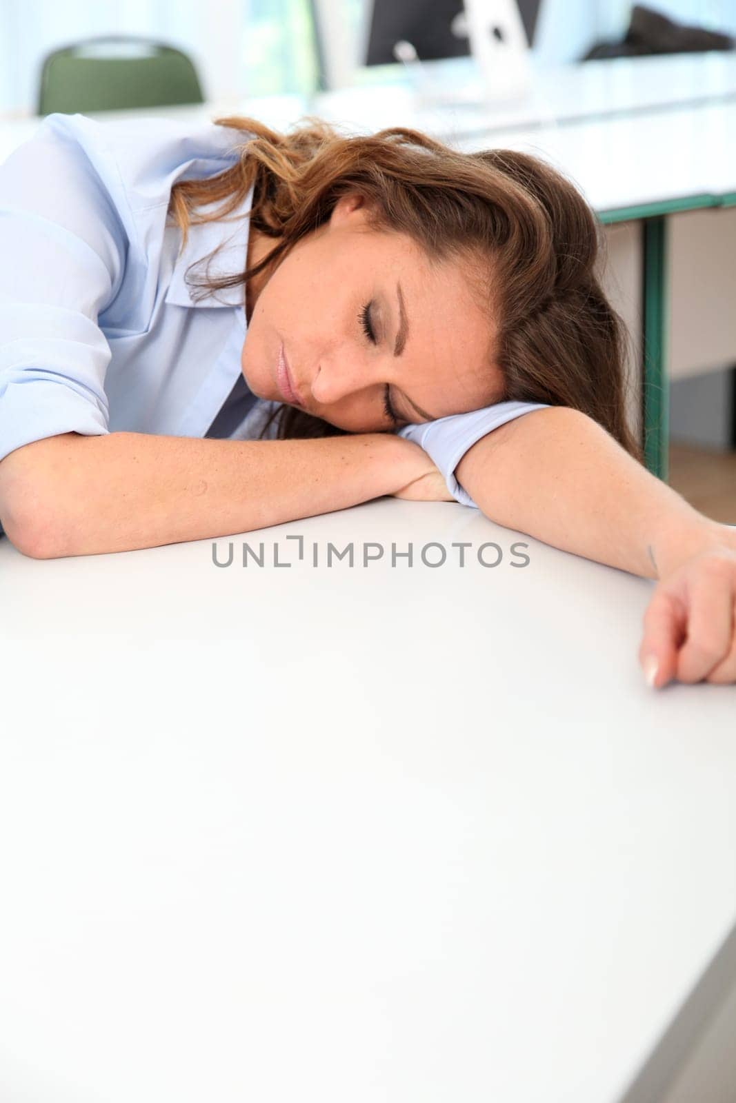 Portrait of exhausted office worker