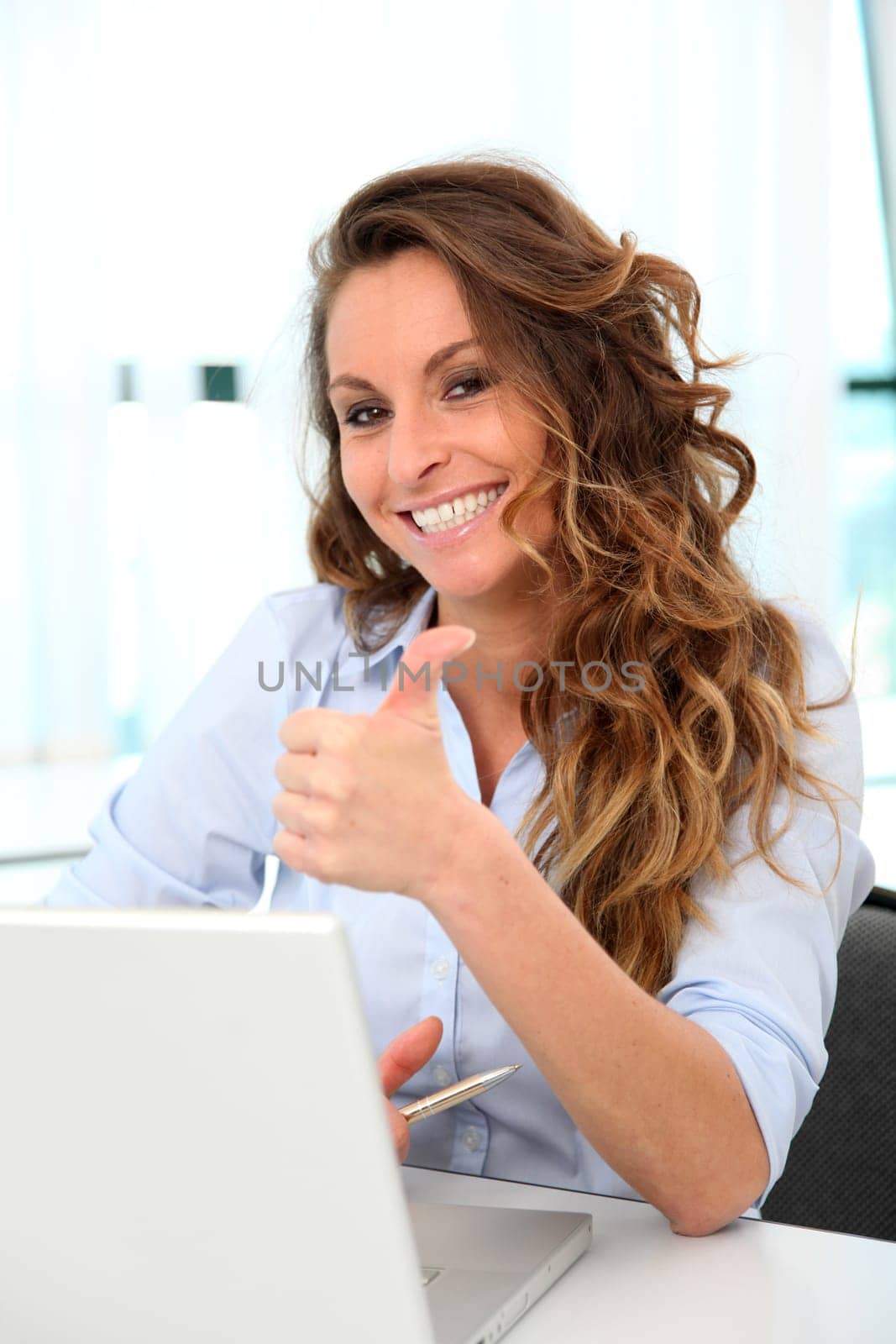 Happy businesswoman with positive attitude
