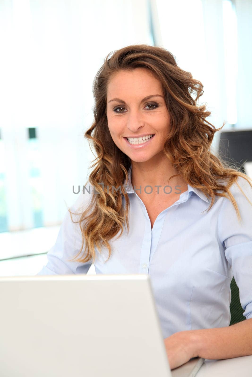 Portrait of smiling businesswoman in the office