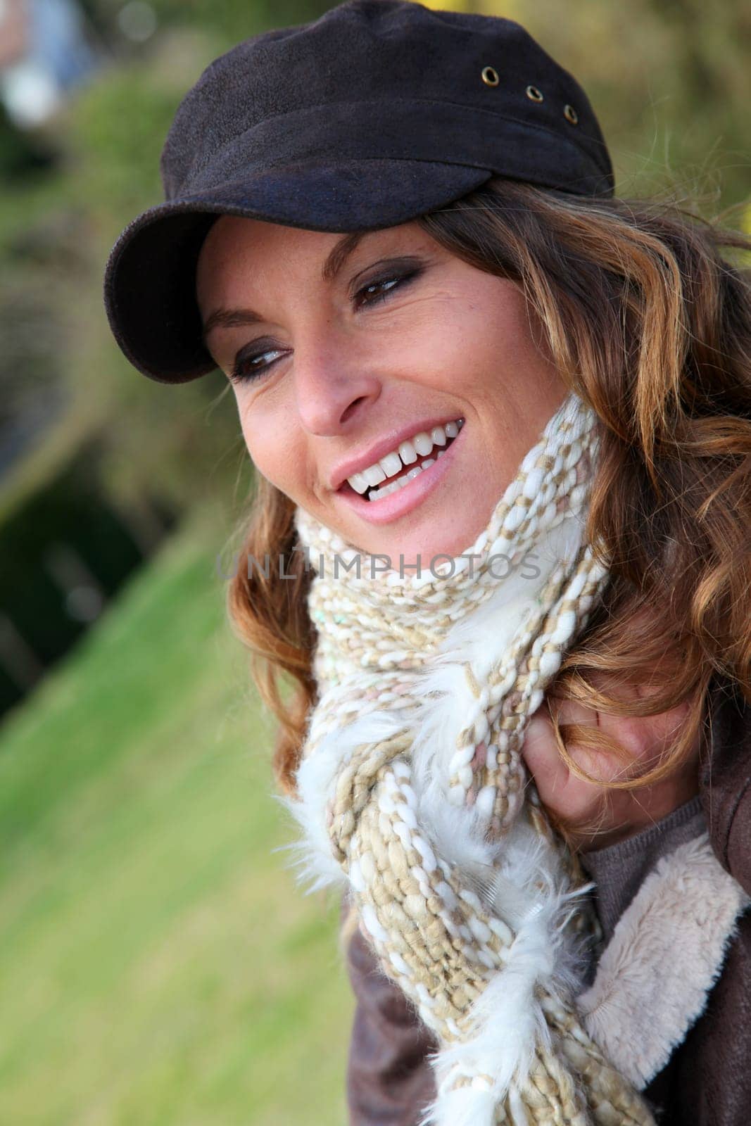 Portrait of beautiful woman with baseball cap