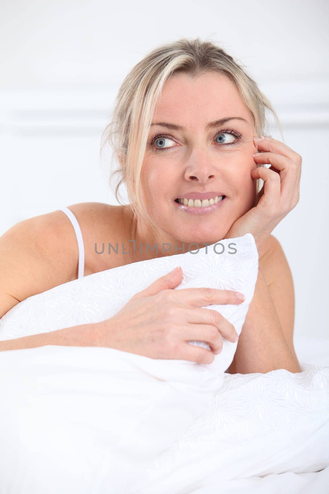 Portrait of beautiful blond woman in the morning