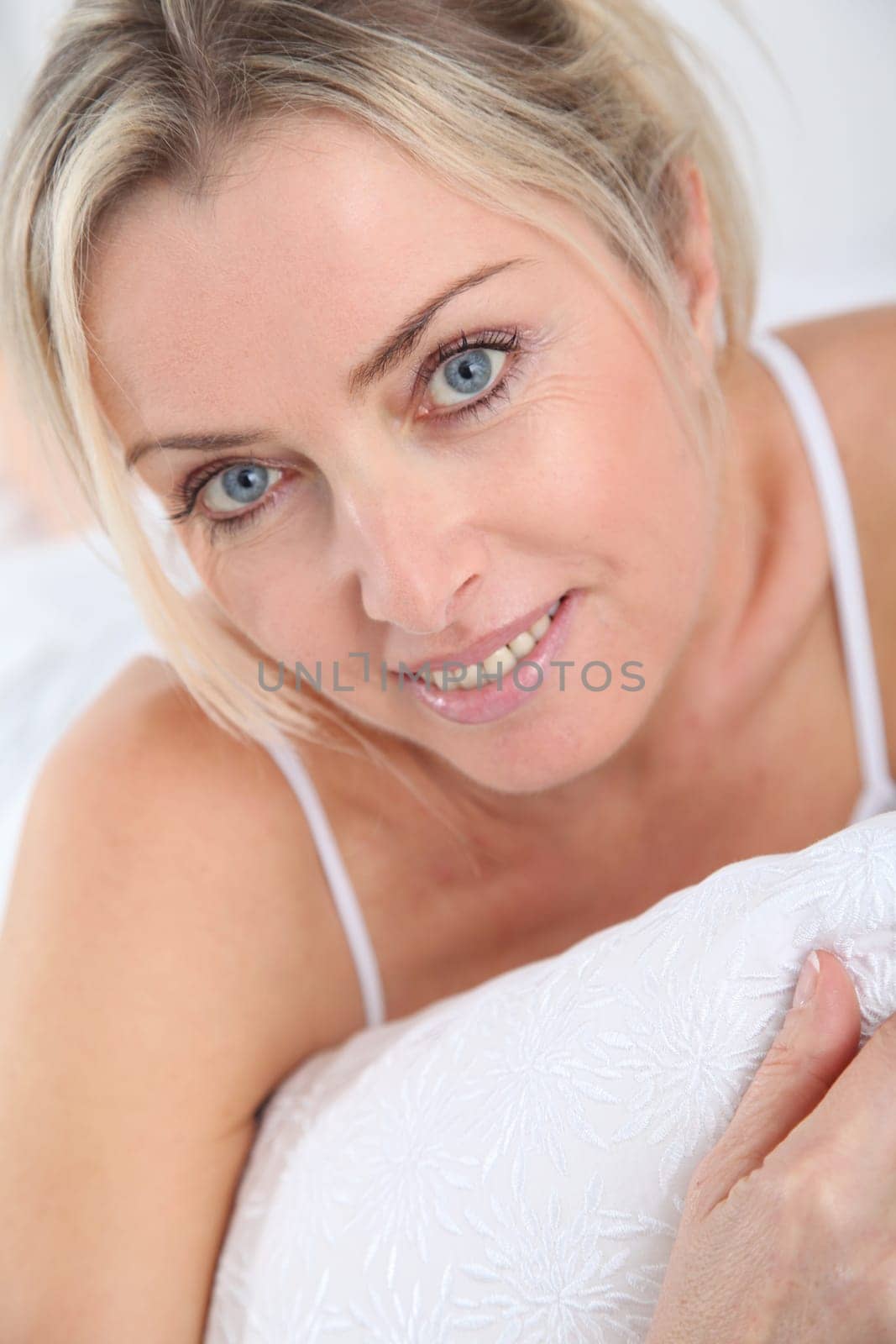 Portrait of beautiful blond woman in the morning