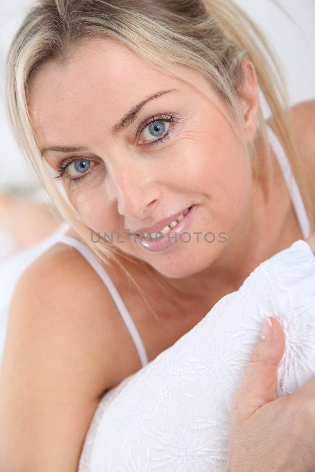 Portrait of beautiful blond woman in the morning