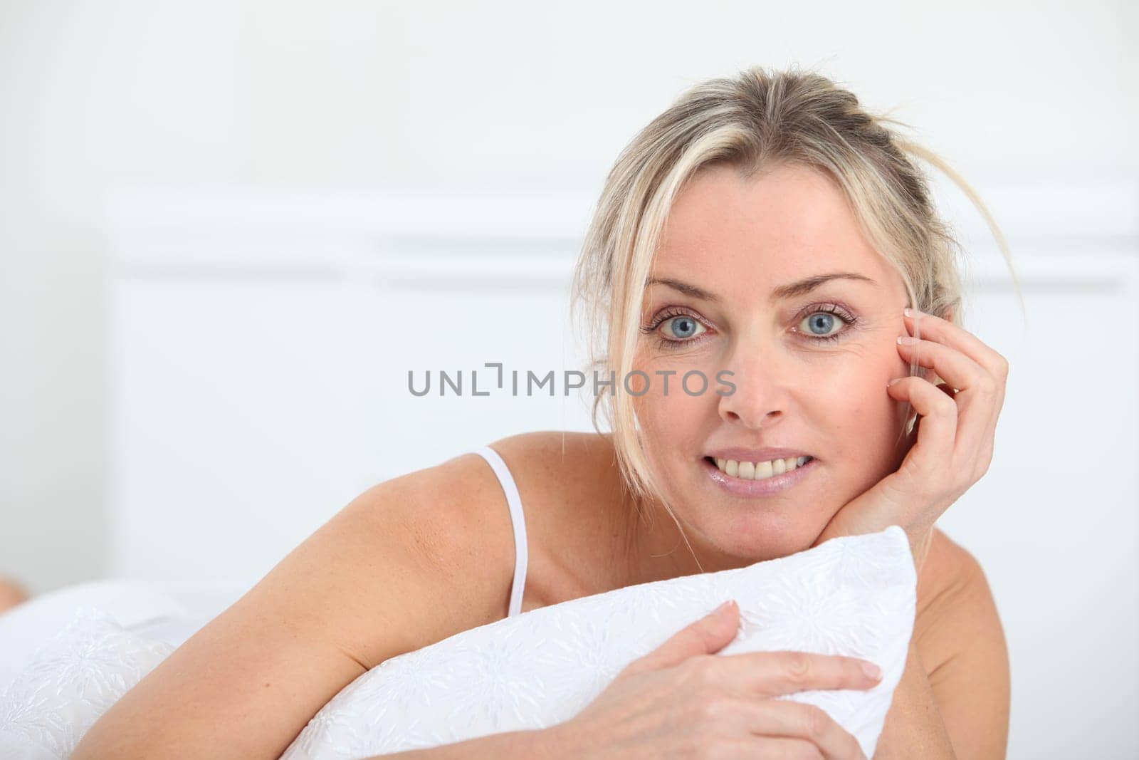 Portrait of beautiful blond woman in the morning