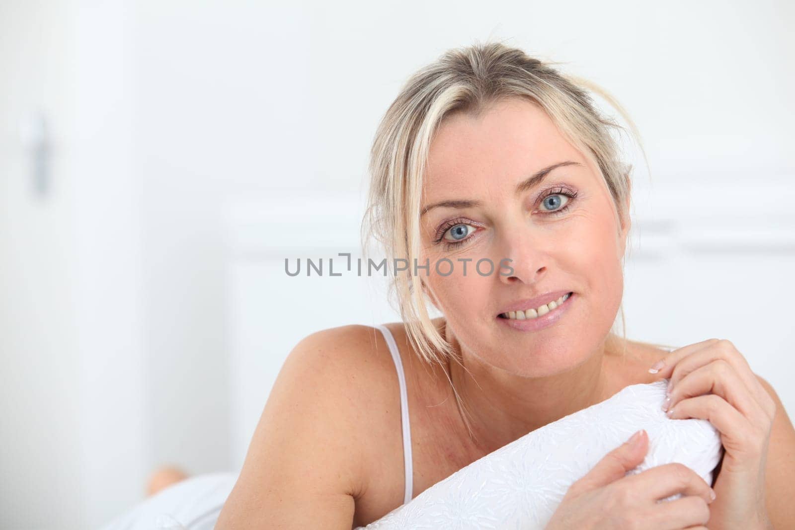 Portrait of beautiful blond woman in the morning