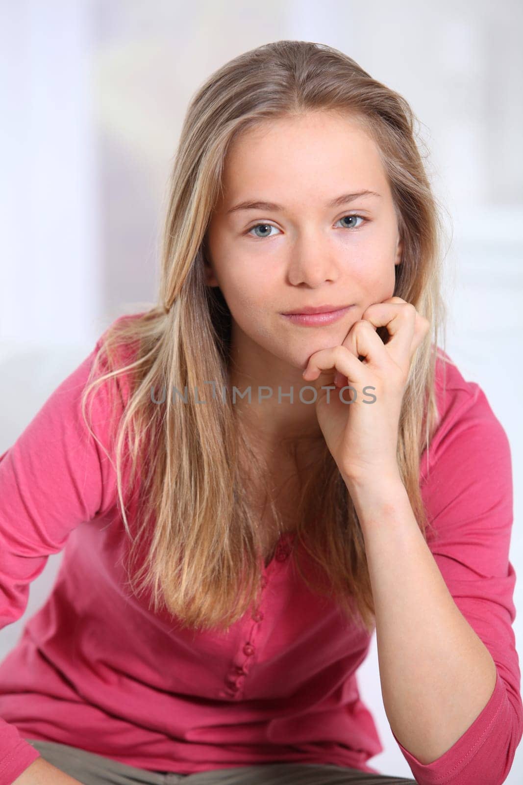 Portrait of beautiful smiling blond girl