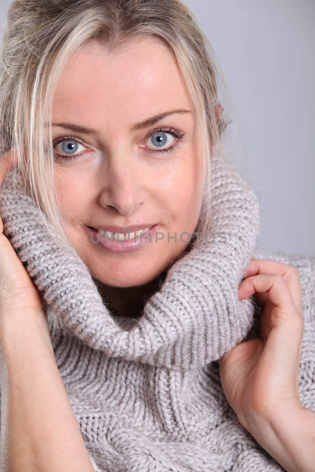 Beautiful woman wearing turtleneck sweater