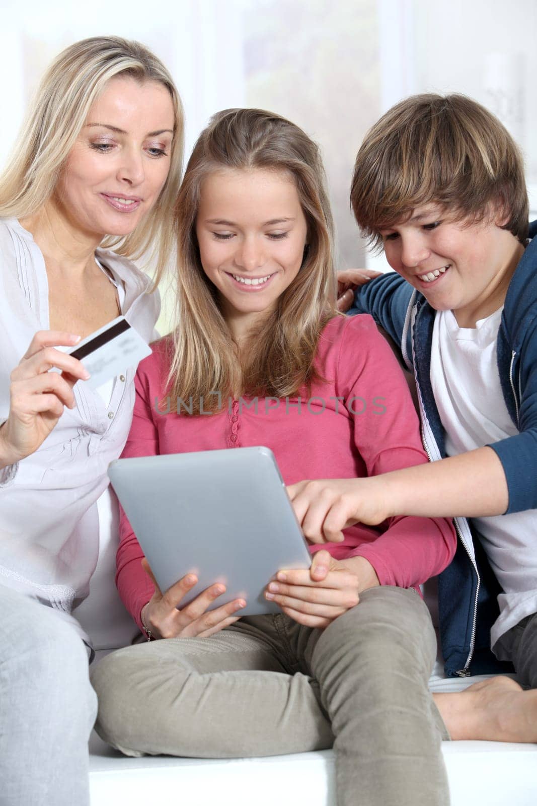Mother and children doing online shopping