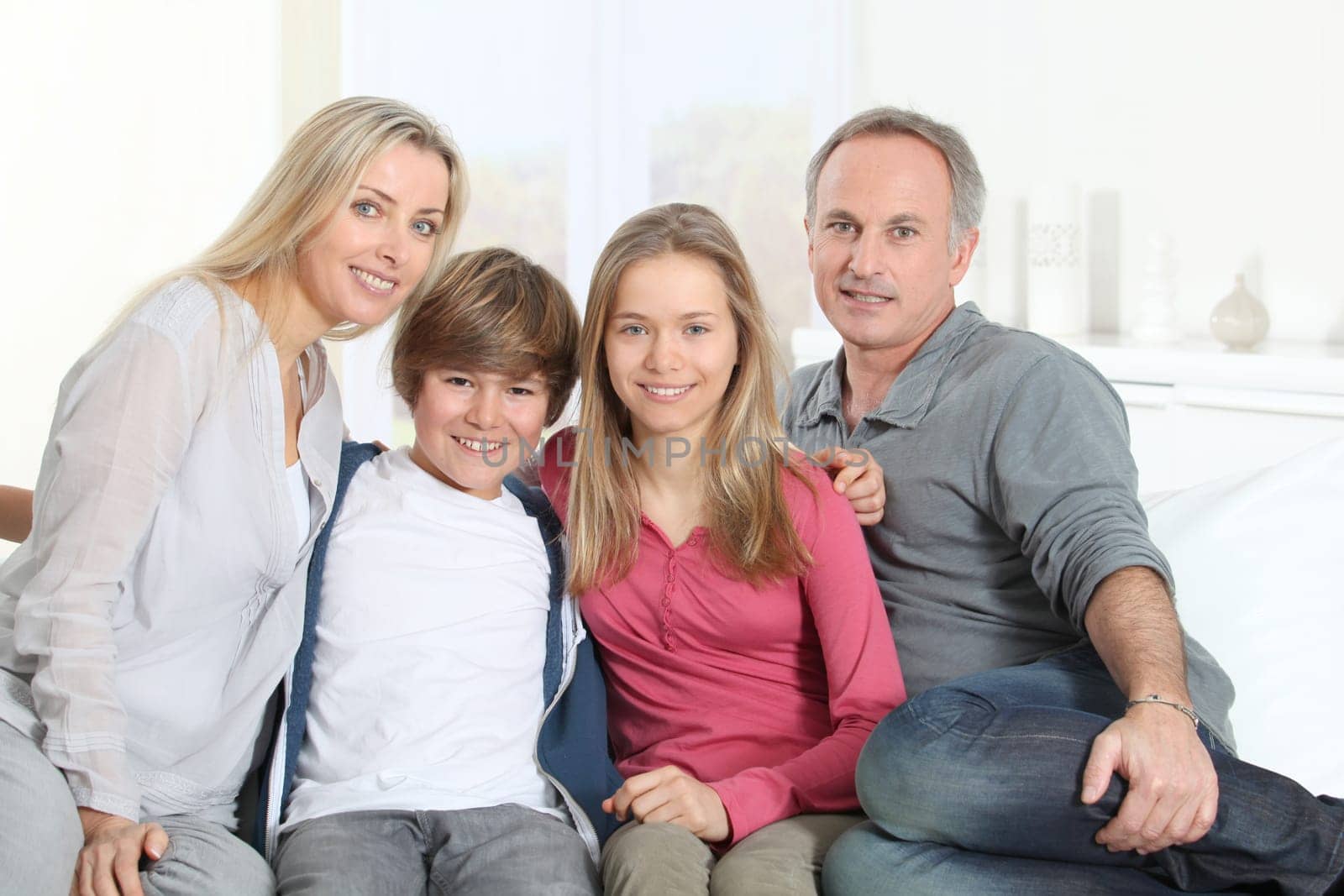 Portrait of happy parents and children