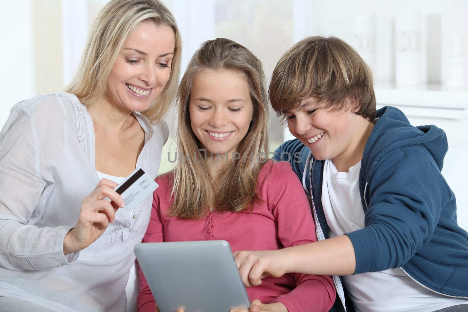 Mother and children doing online shopping