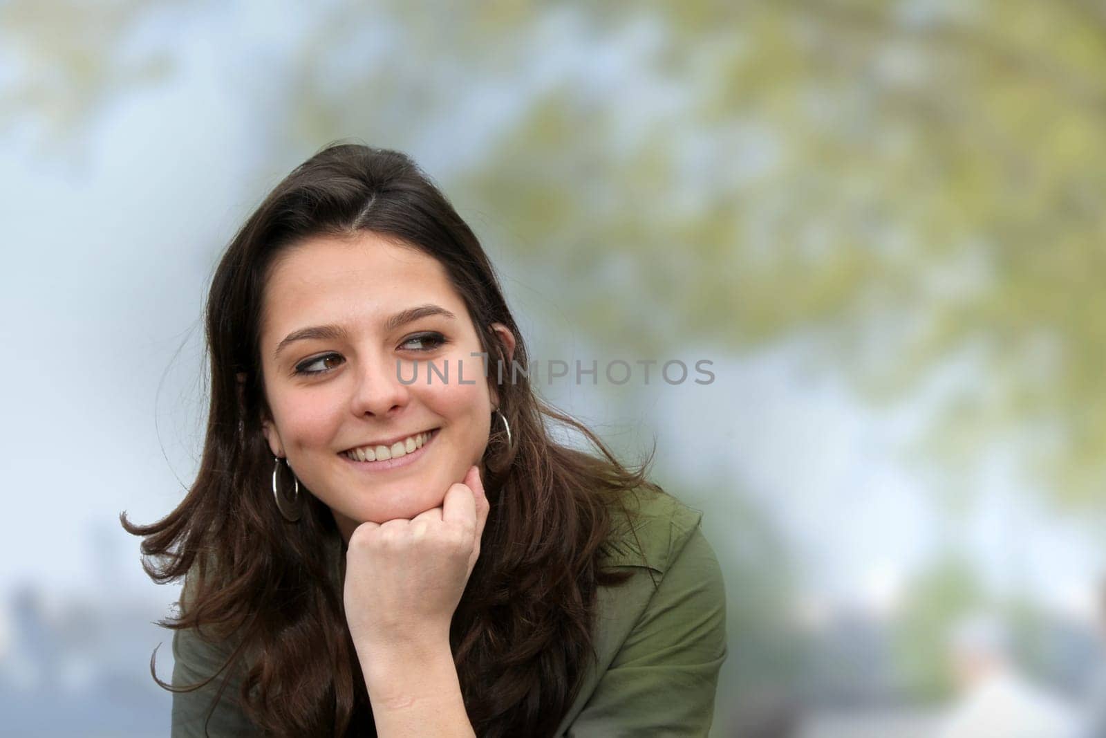 Closeup of teenage girl sitting on a school bench
