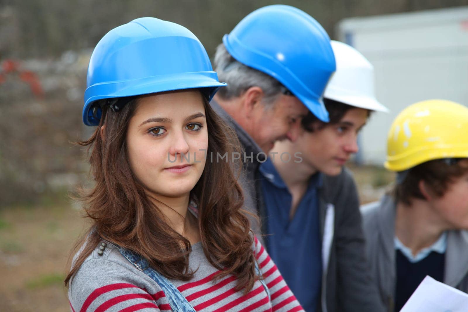 Portrait of teenager with security helmet