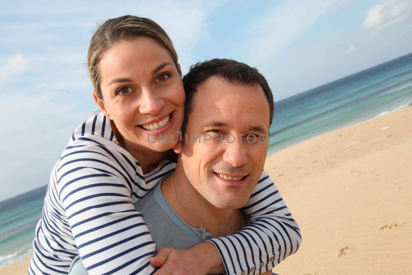 Happy couple at the beach