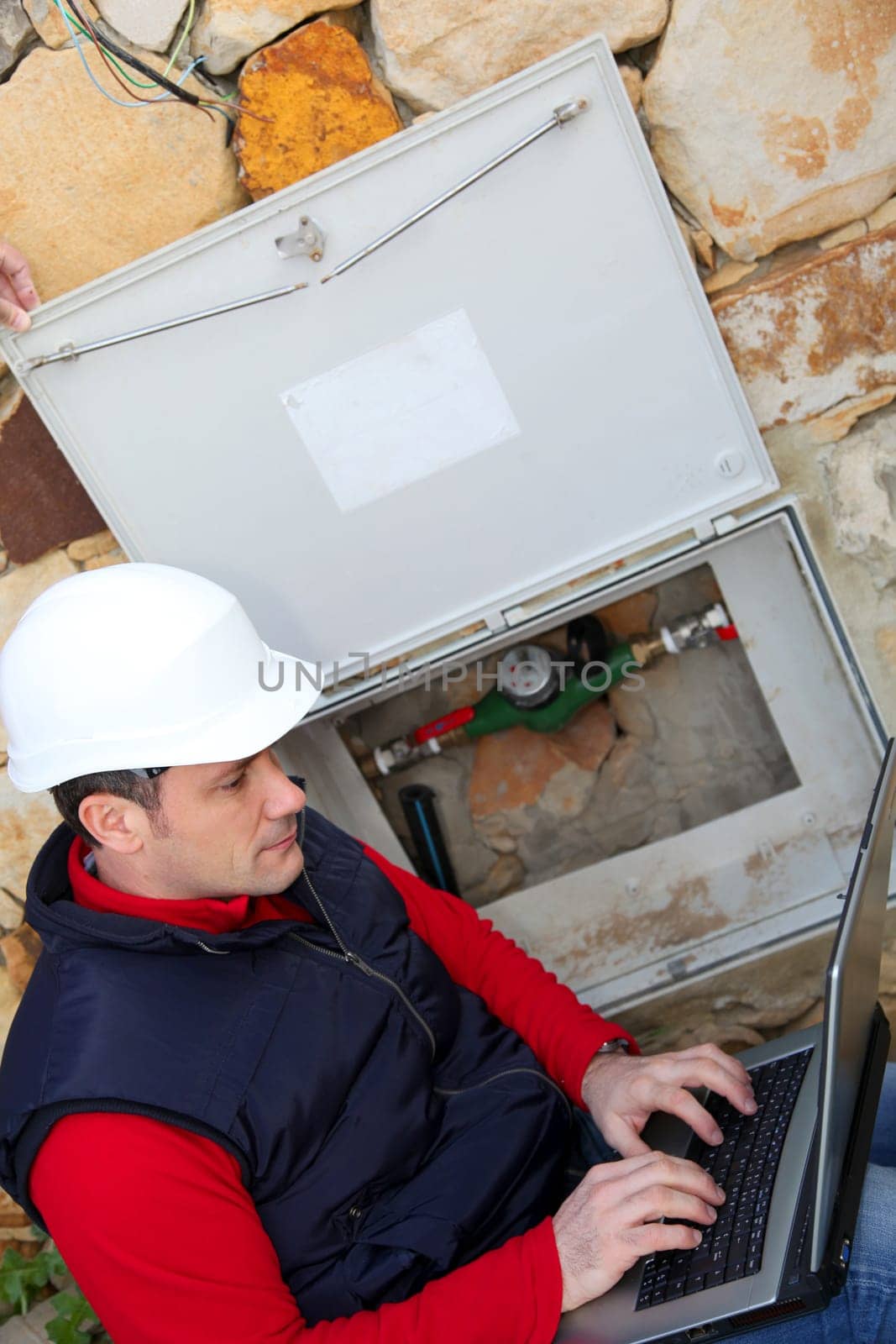 Man reading domestic water consumption