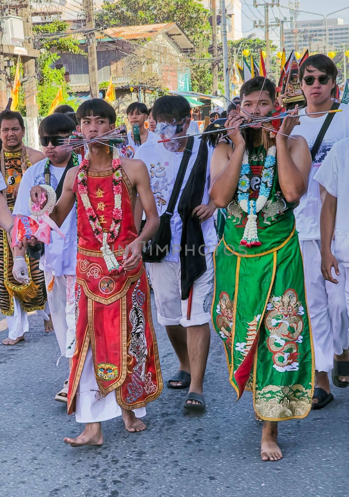 PHUKET, THAILAND - OCTOBER 19: Unidentified participants in street procession ceremony at Hok Ong Tong Shrine, Phuket Vegetarian Festival in Phuket Town, Phuket, Thailand on the 19th October, 2023.