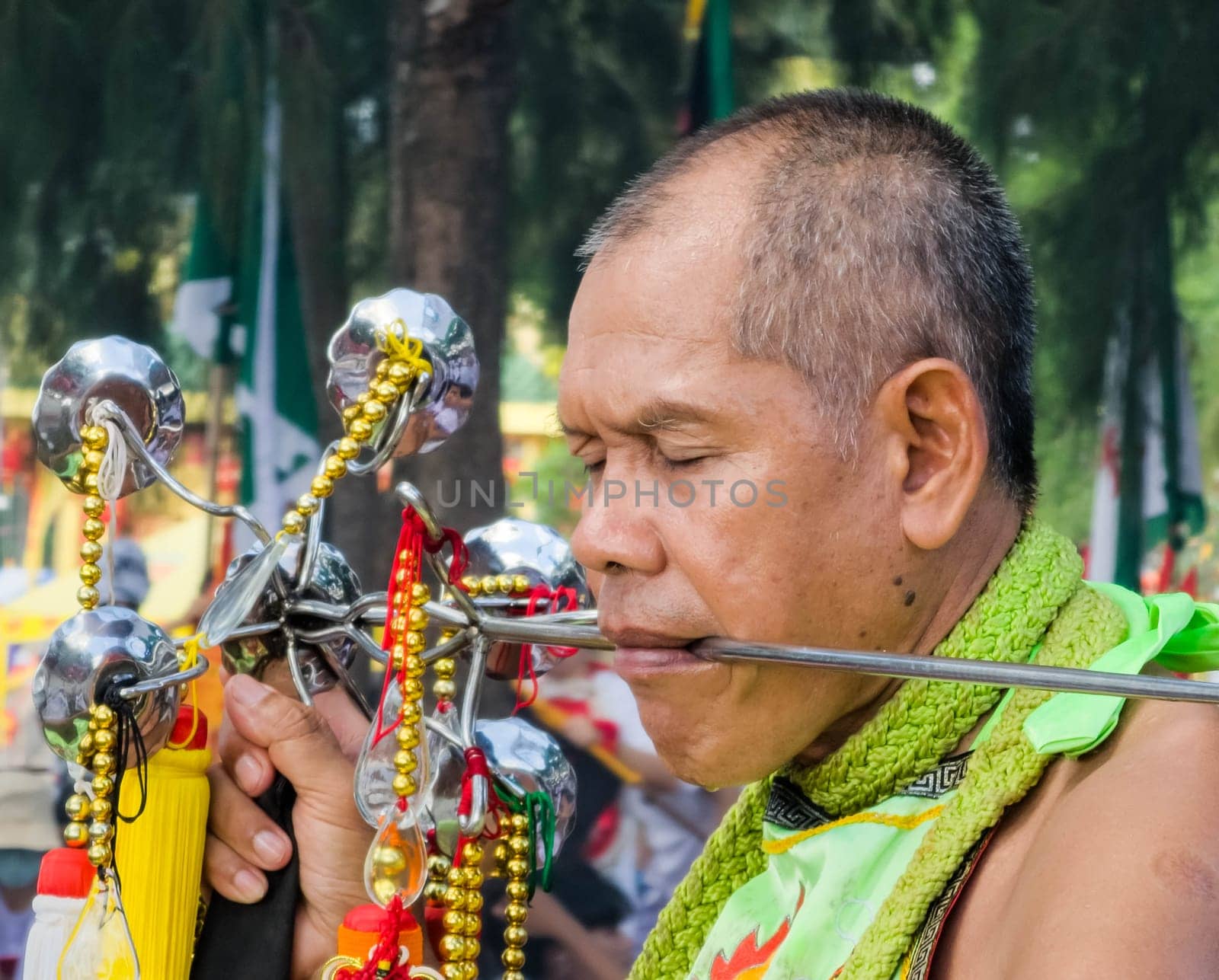 PHUKET, THAILAND - OCTOBER 19: Unidentified participants in street procession ceremony at Hok Ong Tong Shrine, Phuket Vegetarian Festival in Phuket Town, Phuket, Thailand on the 19th October, 2023.