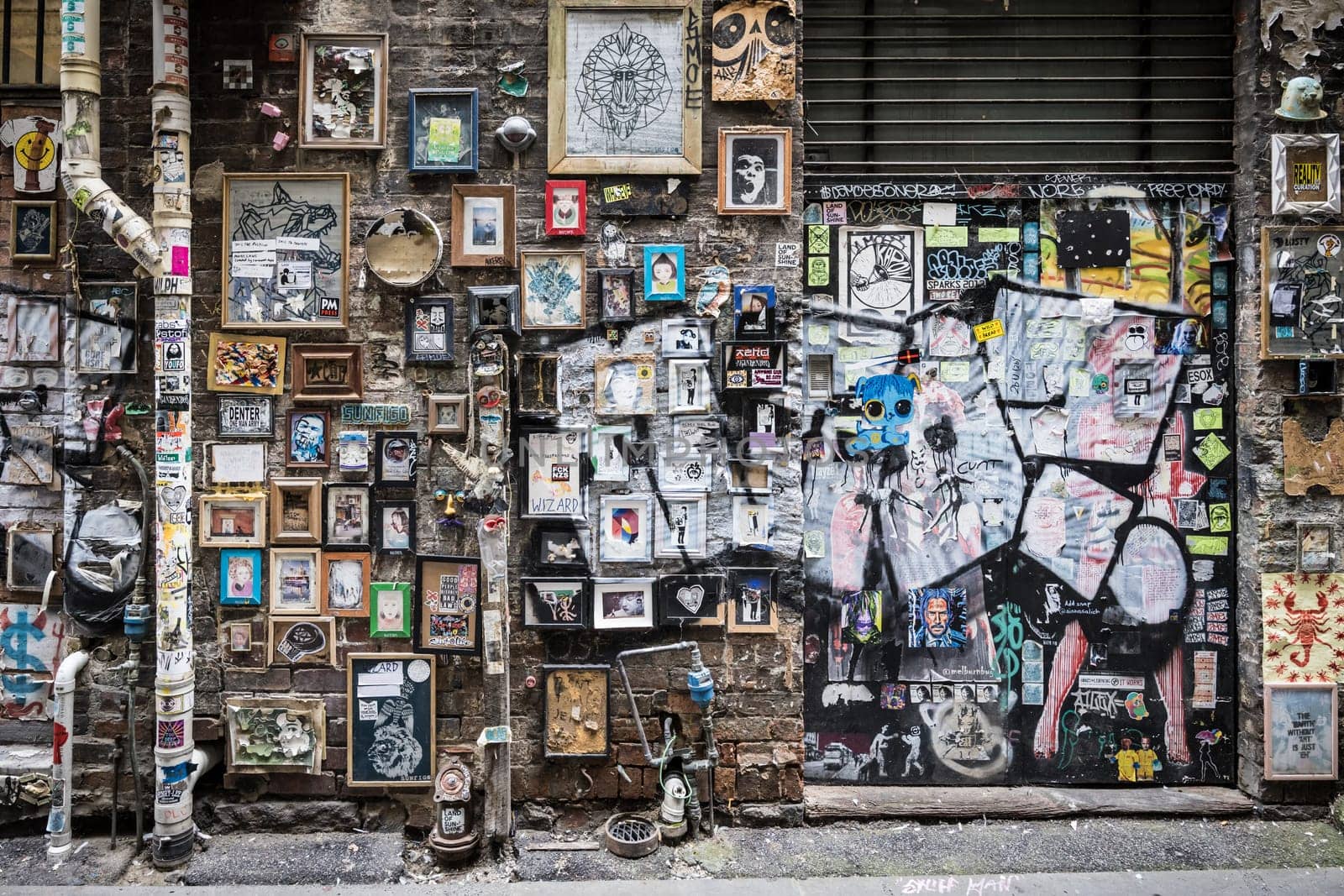 MELBOURNE, AUSTRALIA - MARCH 26 2023 -Street art and graffiti in Presgrave Place, near Collins St in Melbourne CBD on a spring morning in Victoria, Australia