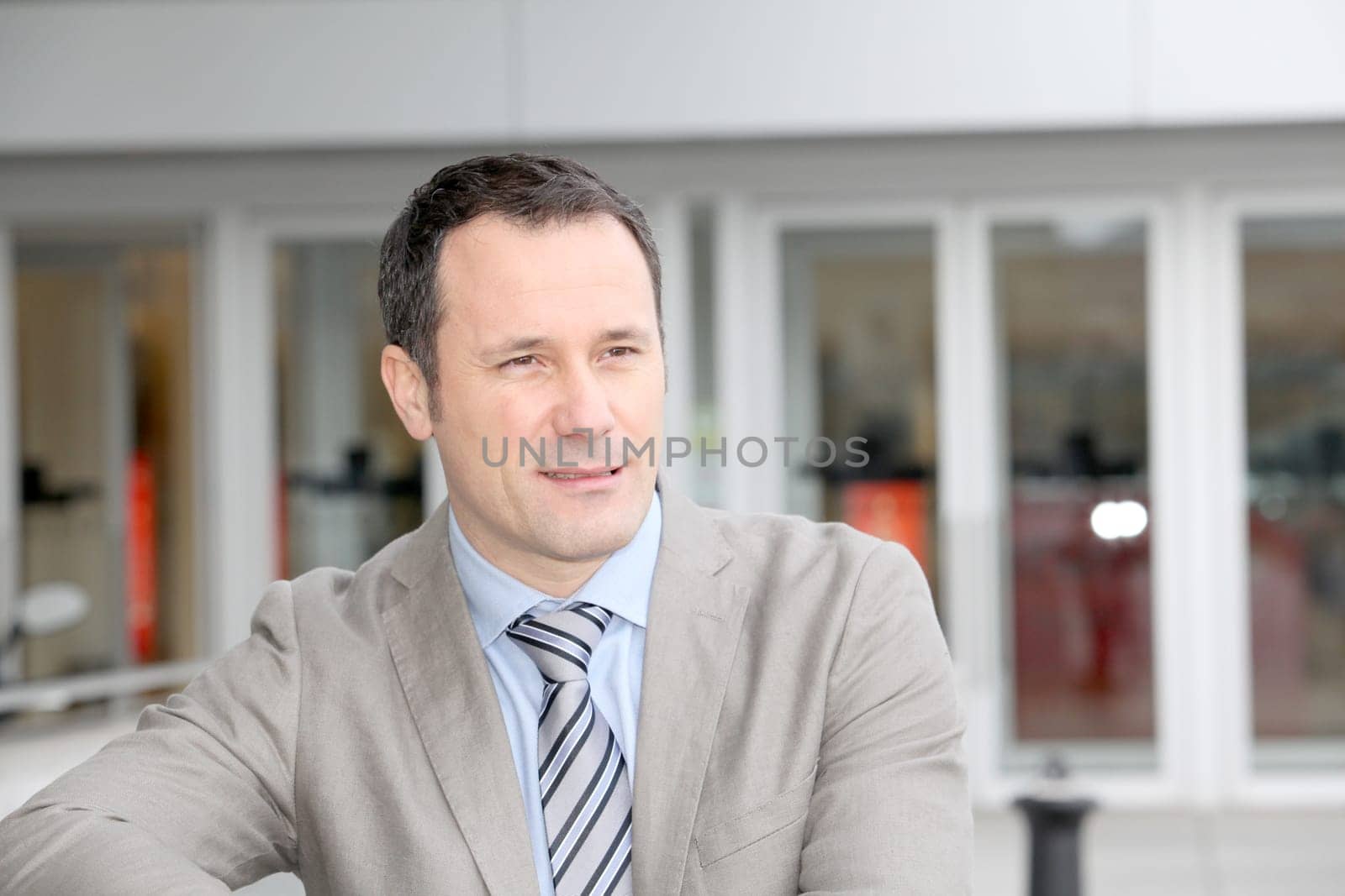 Businessman standing outside the office