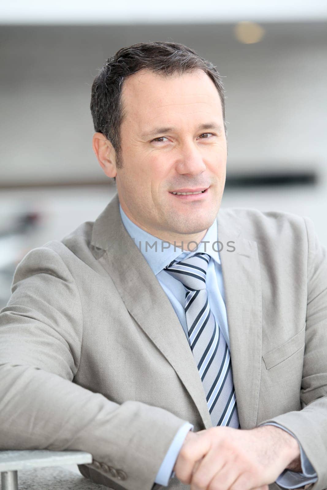 Businessman standing outside the office