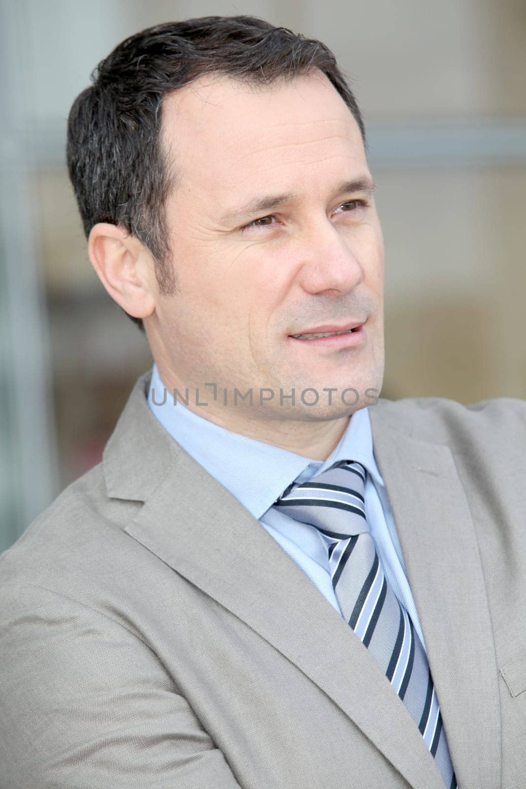 Businessman standing outside the office