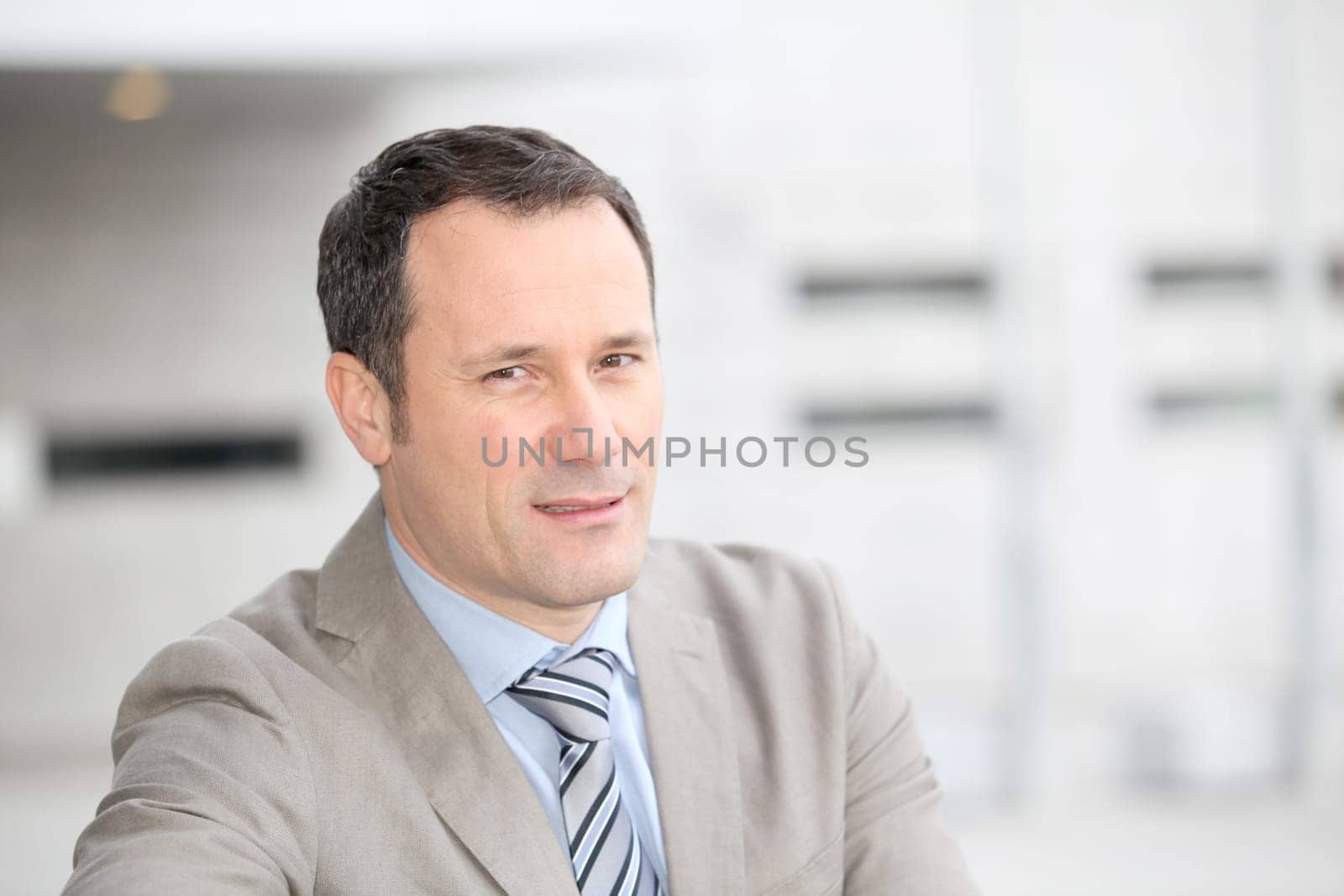 Businessman standing outside the office