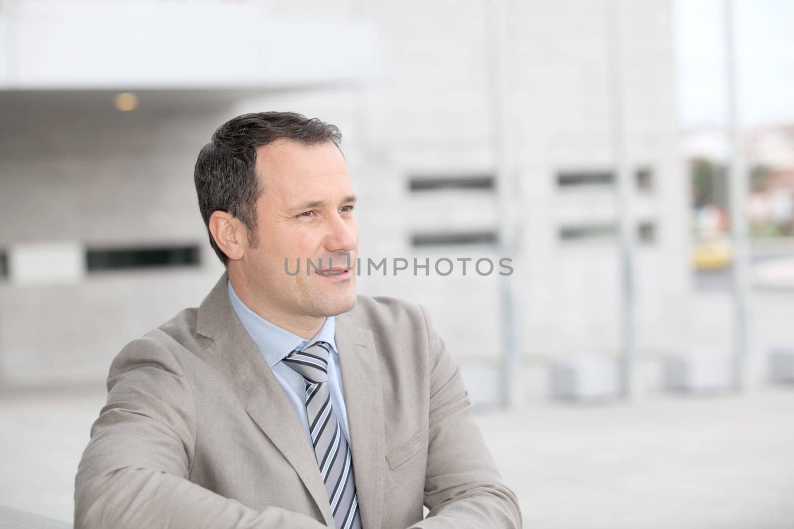 Businessman standing outside the office