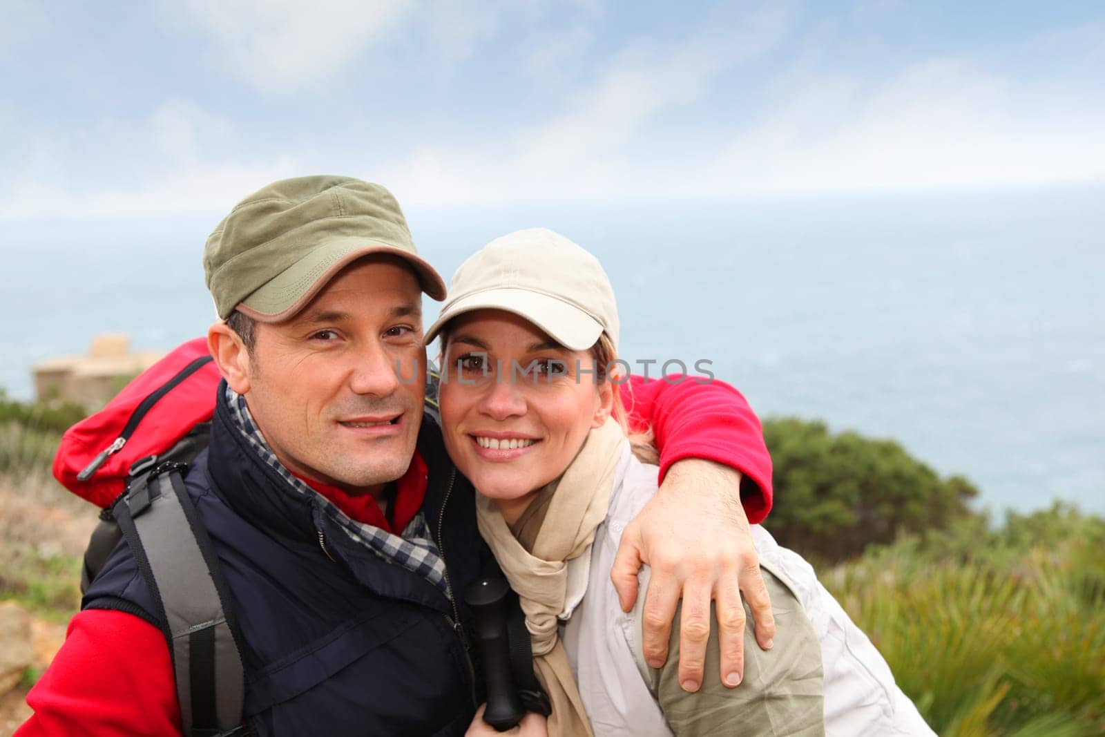 Portrait of happy couple on hiking day