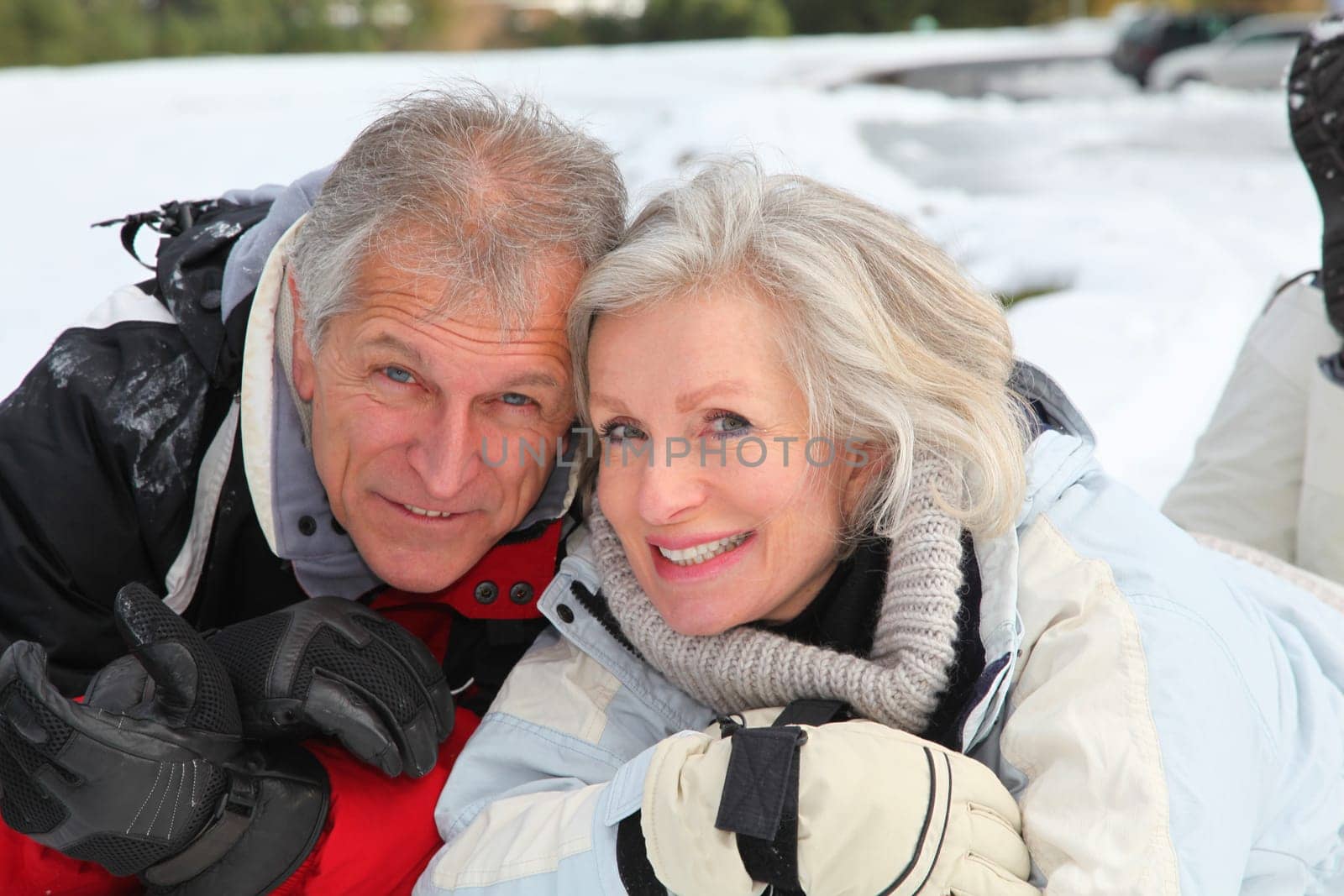 Senior couple having fun at ski resort