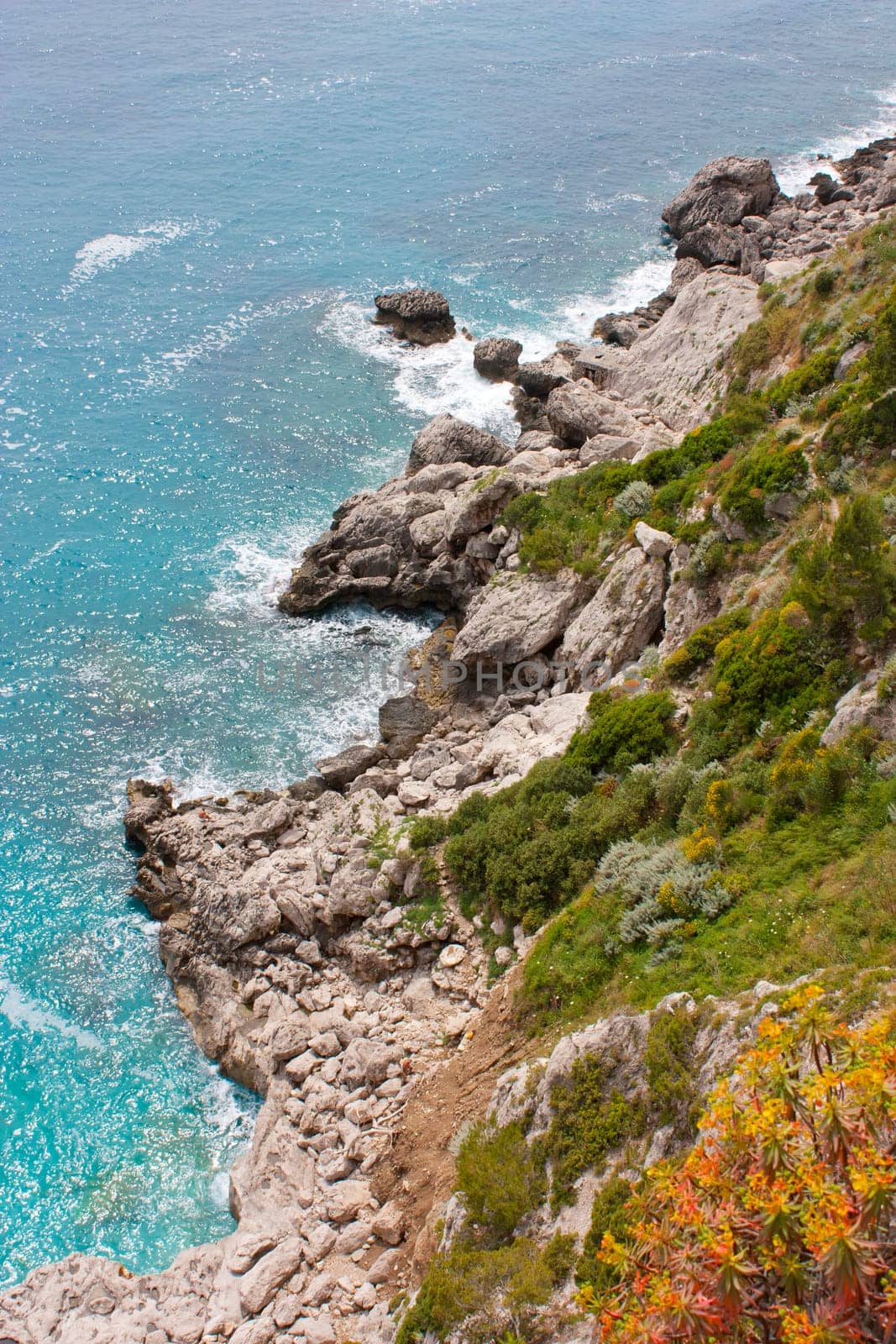 Coast of Capri Island, view of sea and sea-cliff