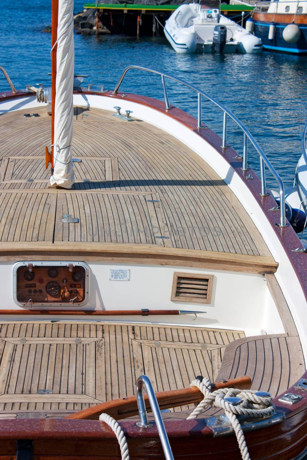 Close-up view of a nice sailboat in the port of Capri